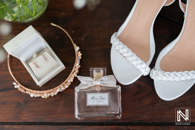 Bride's shoes, perfume and tiara