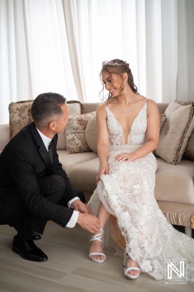 Bride's dad fitting the shoes
