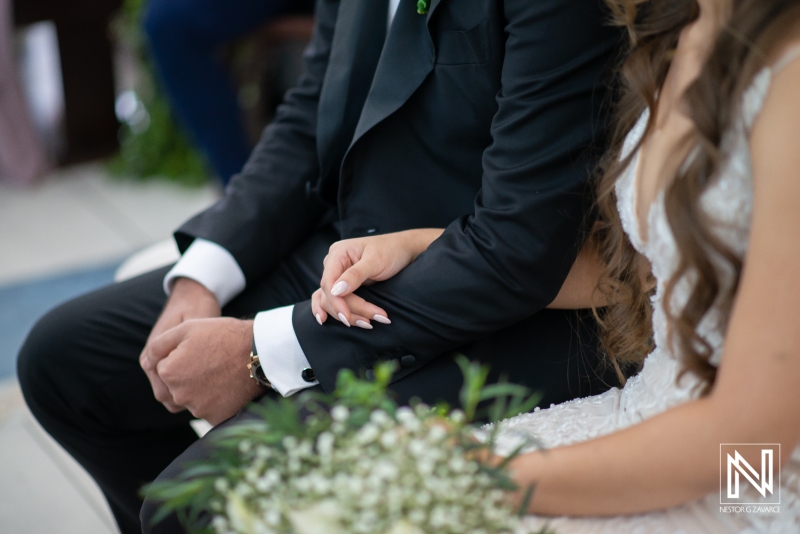 Bride and groom's hands