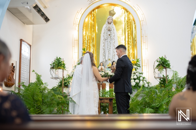 Bride and groom with Virgin Mary