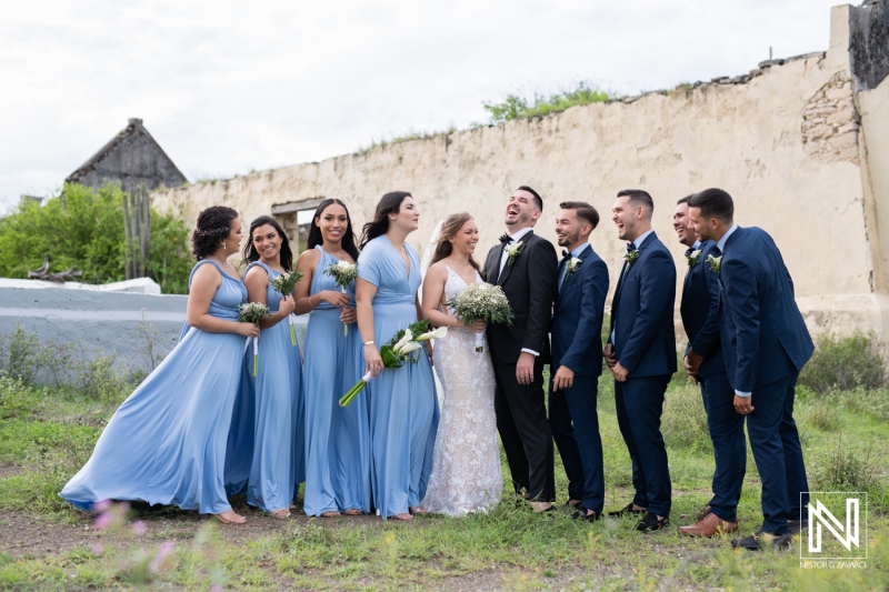 Bride and groom with wedding party at the photo session