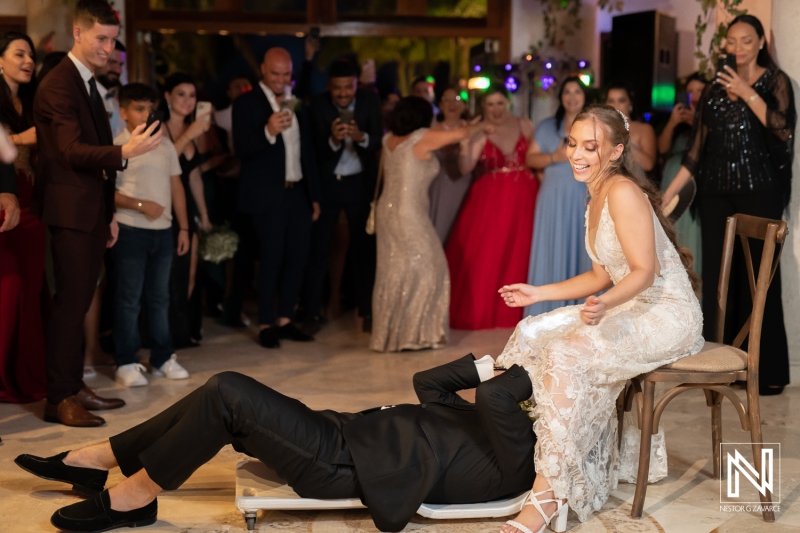 Groom getting the garter