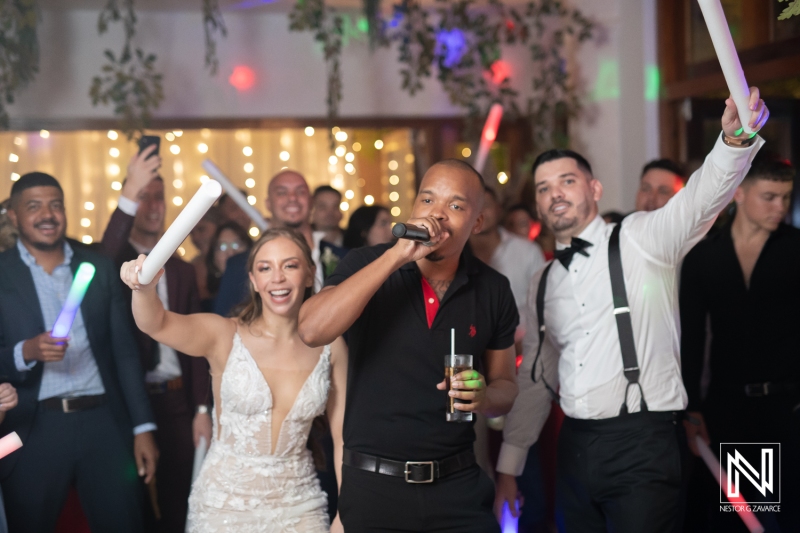 Bride and groom with singer