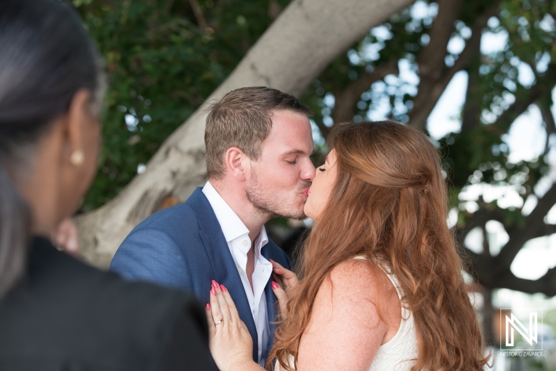 Bride and groom kissing  in the wedding ceremony