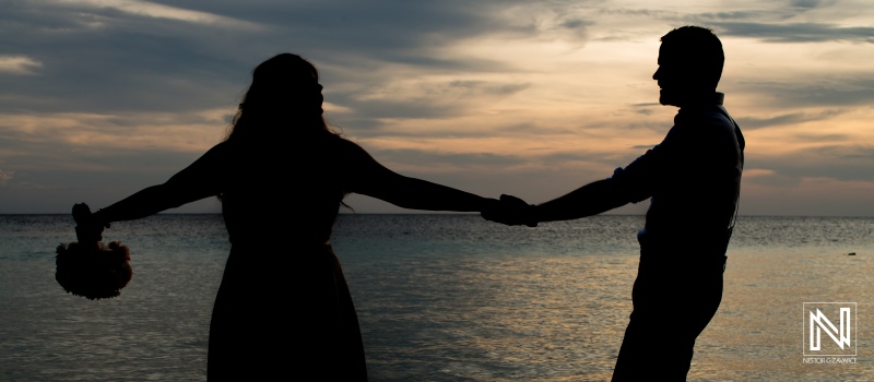 Bride and groom photoshoot with the beach sunset