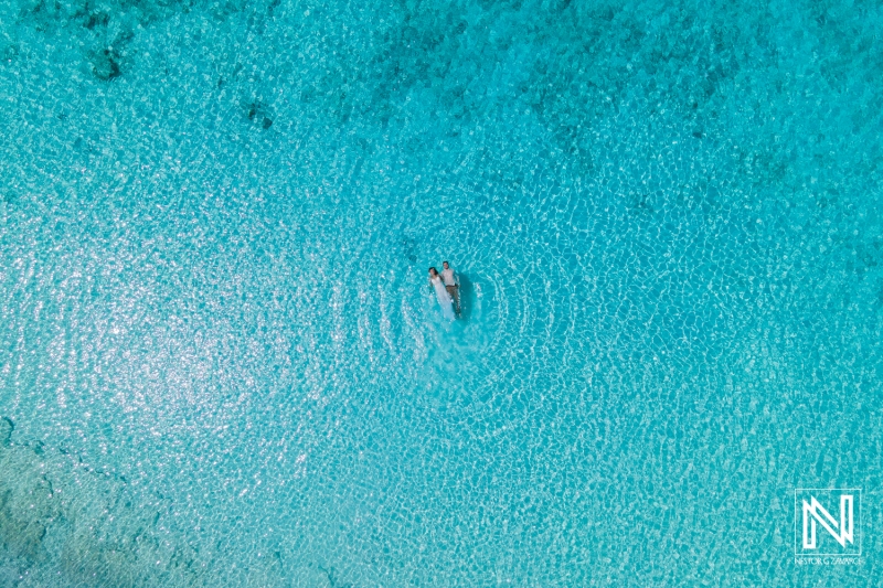 Couple's photo session drone shot at the sea