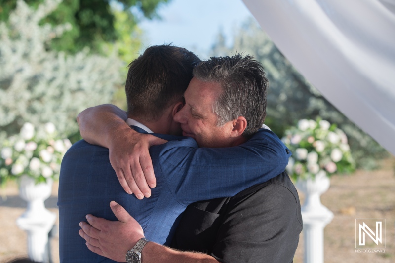 Emotional moment at a wedding ceremony at Dreams Curacao Resort