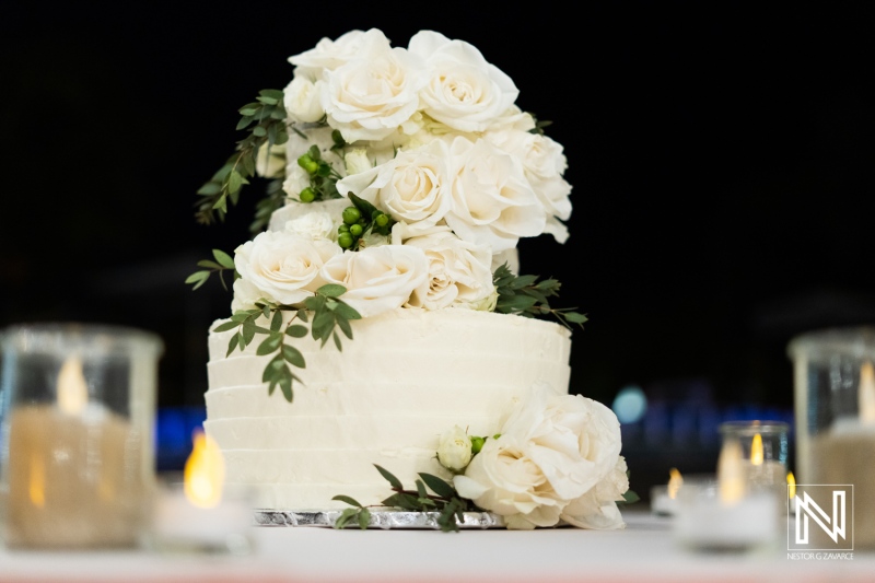 Wedding cake display at Dreams Curacao Resort during a celebration event