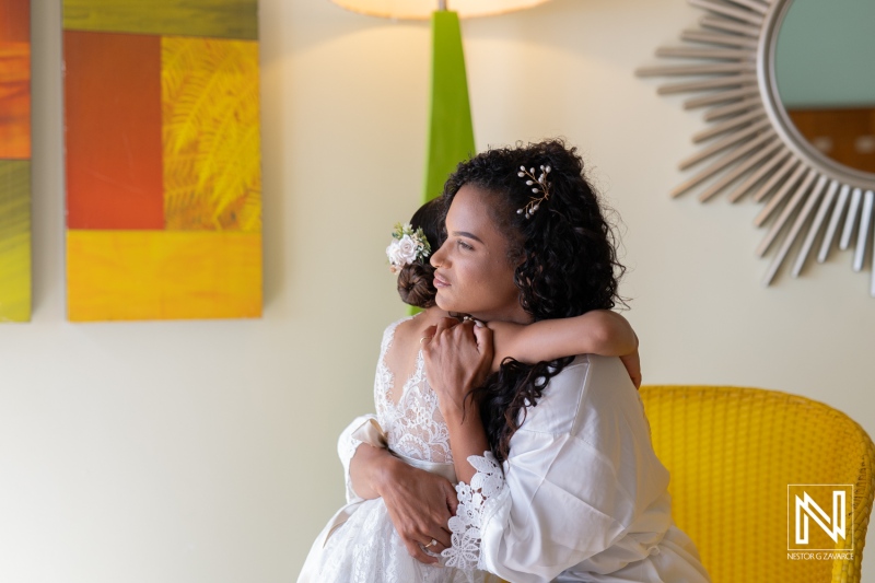 Emotional embrace between mother and daughter before wedding ceremony at Sunscape Curacao Resort