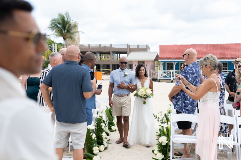 Wedding ceremony at Sunscape Curacao Resort with bride and groom surrounded by guests on a sunny day