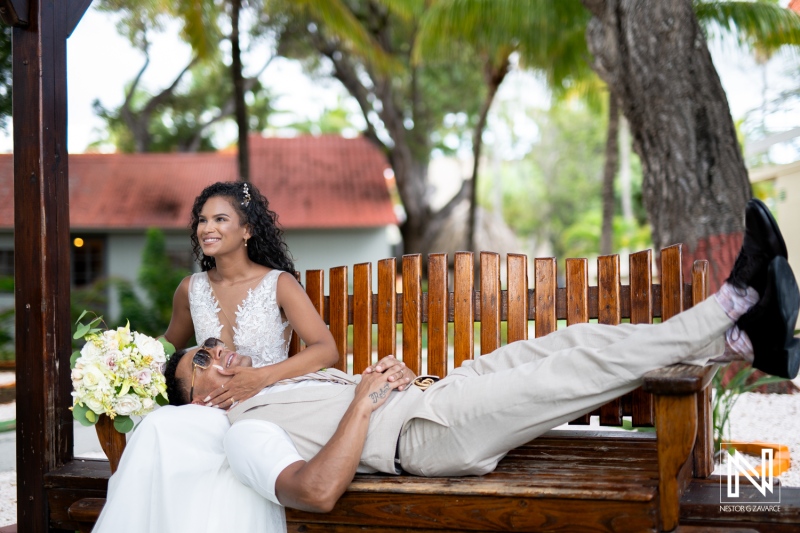 Couple enjoys intimate moment during tropical wedding at Sunscape Curacao Resort in the Caribbean