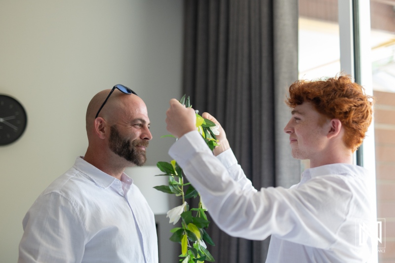 Celebration of love at Avila Beach Hotel in Curacao during sunset with joyful moments shared between family members