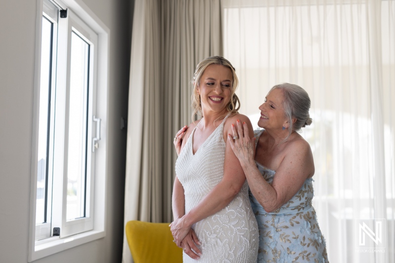 Celebrating love and joy during wedding preparations at Avila Beach Hotel in Curacao during a stunning sunset