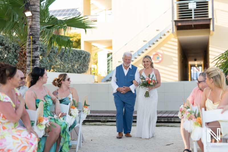 Celebration of love at sunset during a wedding at Avila Beach Hotel in Curacao