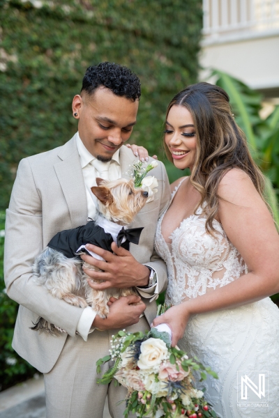 Bride and groom with dog