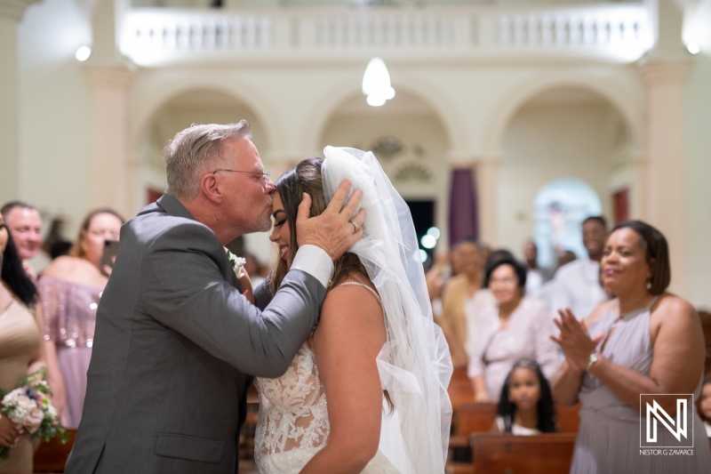 Father's kiss to the bride