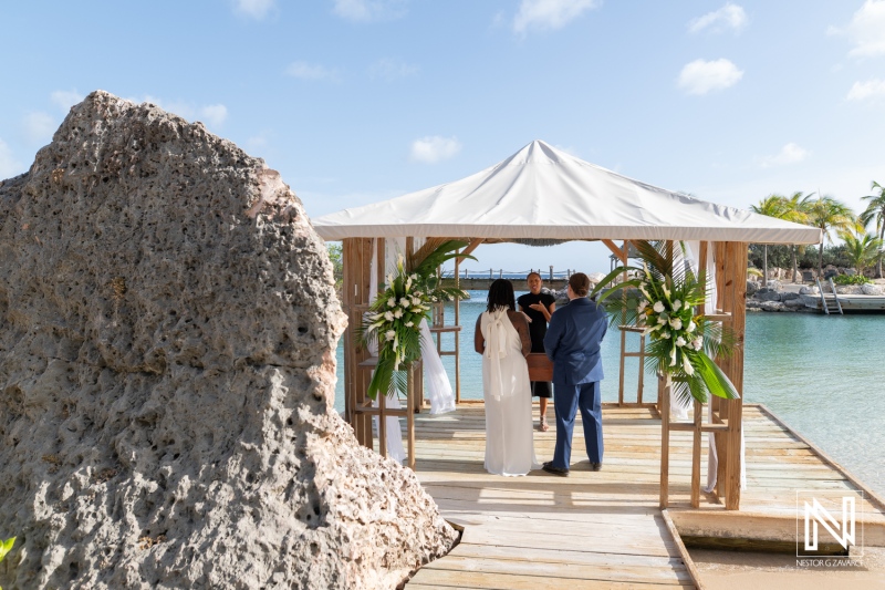 Dream wedding ceremony at Baoase Luxury Resort in Curacao by the serene waters