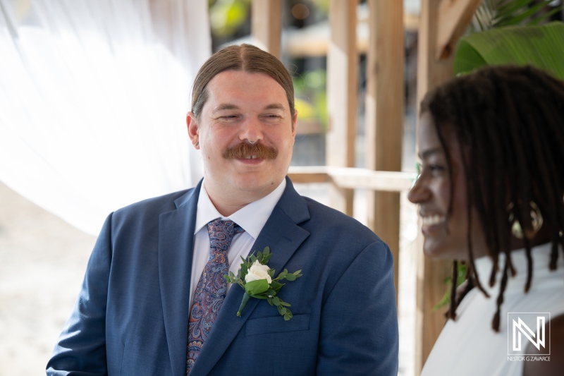 Couple exchanging vows during a romantic wedding ceremony at Baoase Luxury Resort in Curacao