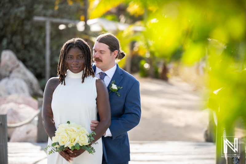 Stunning couple celebrates their wedding at Baoase Luxury Resort in Curacao under warm sunlight