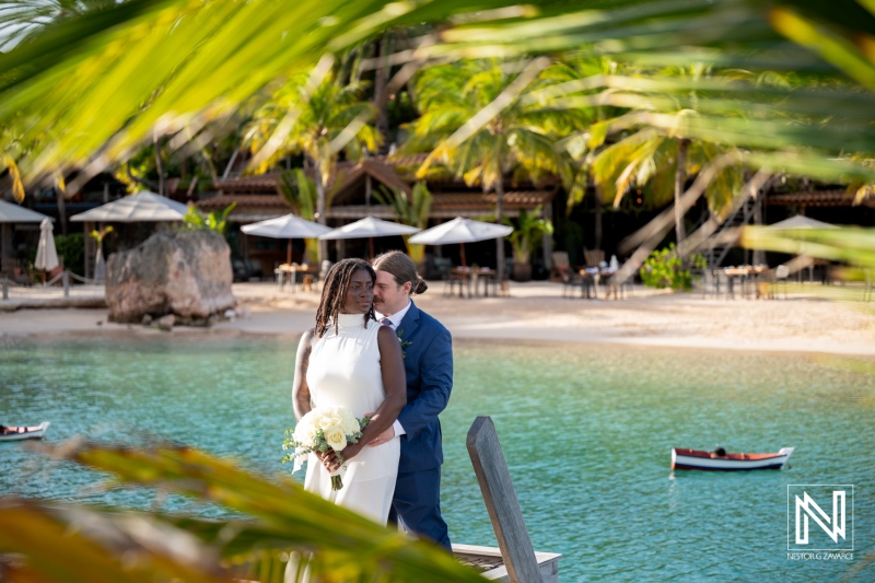 Couple shares a romantic moment during a wedding ceremony at Baoase Luxury Resort in Curacao