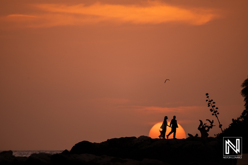 Wedding sunset stroll at Baoase Luxury Resort in Curacao captures romance and beauty of a perfect evening together