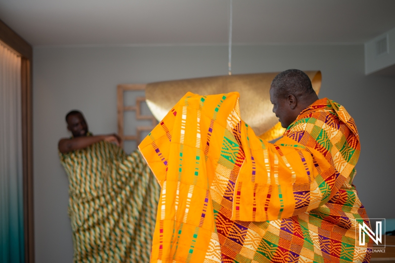 Groom getting dressed