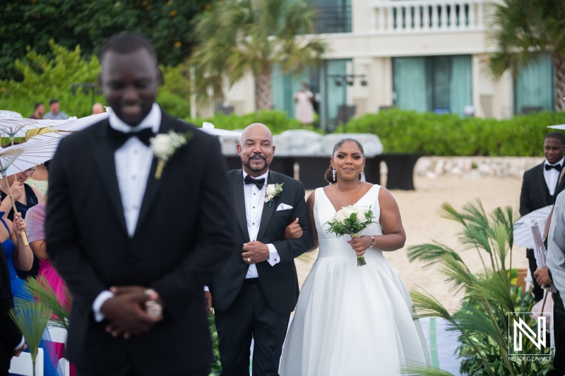 Bride and father walking down the isle