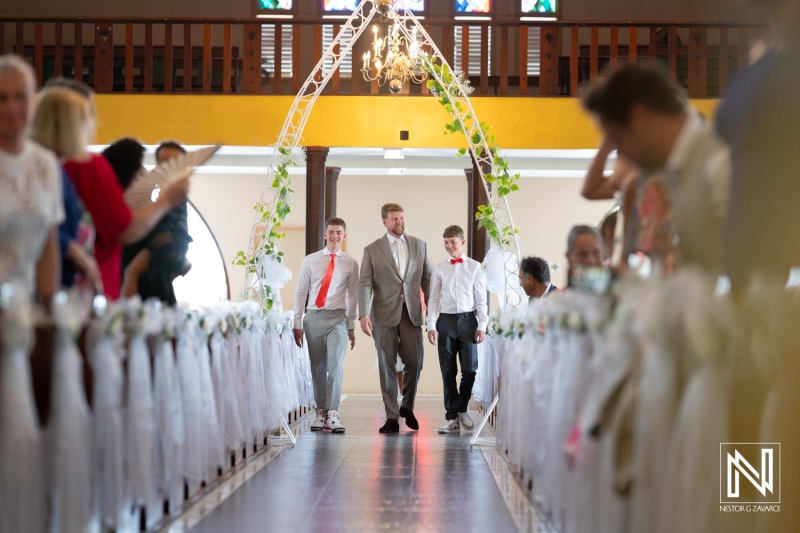 Groom walking down the aisle