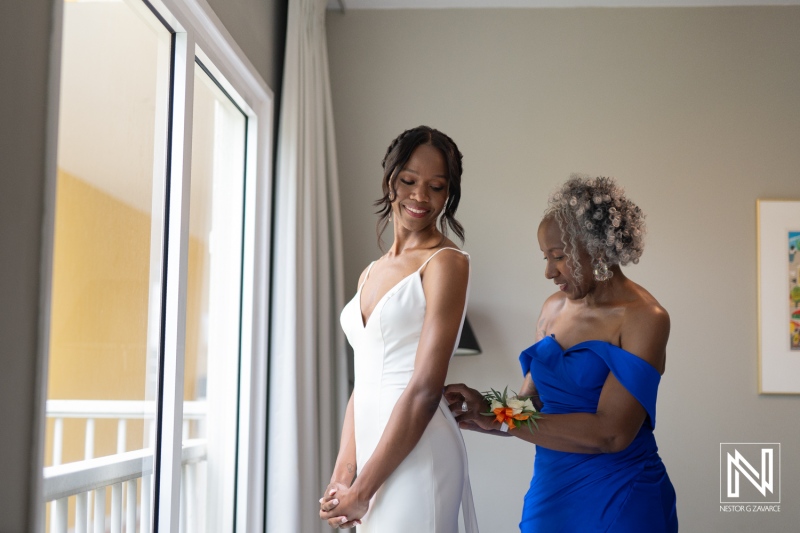Beautiful wedding preparation at Avila Beach Hotel in Curacao with bride and mother moments captured