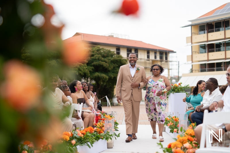 Elegant wedding ceremony at Avila Beach Hotel in Curacao with family and joyful moments