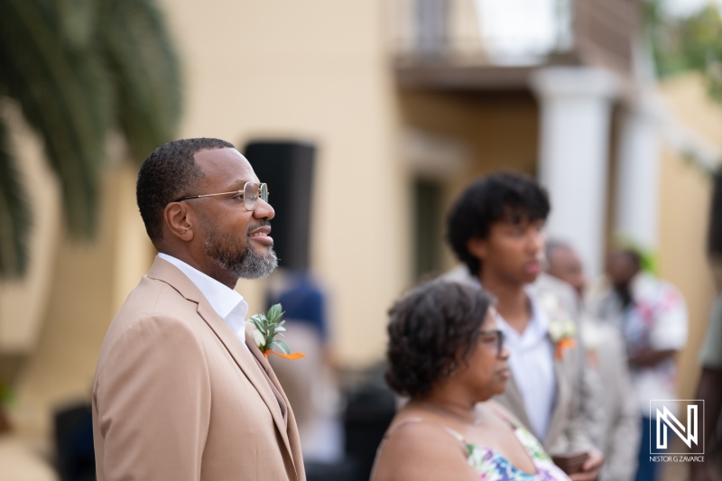 Ceremony moments at Avila Beach Hotel wedding in Curacao, celebrating love in a beautiful coastal setting