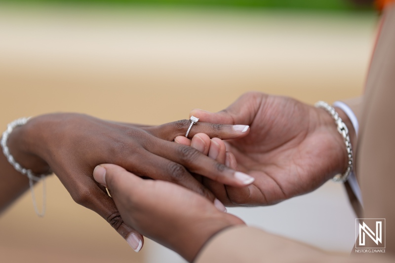 Beautiful exchange of wedding rings during a destination ceremony at Avila Beach Hotel in Curacao