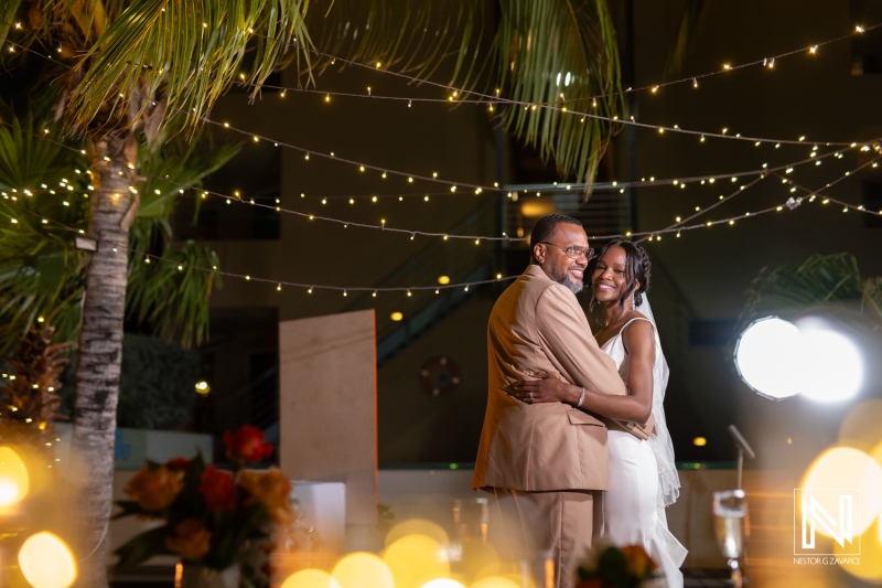 Celebrate love under twinkling lights at Avila Beach Hotel in Curacao during a beautiful wedding ceremony