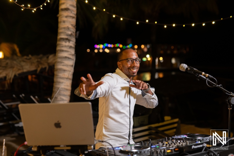 Exciting DJ performance at a destination wedding celebration at Avila Beach Hotel in Curacao during a romantic evening