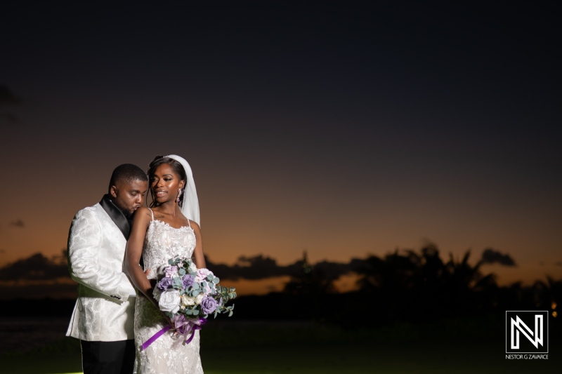 A Romantic Sunset Moment Captures a Couple as They Share an Intimate Embrace Before the Wedding Ceremony on a Beautiful Evening