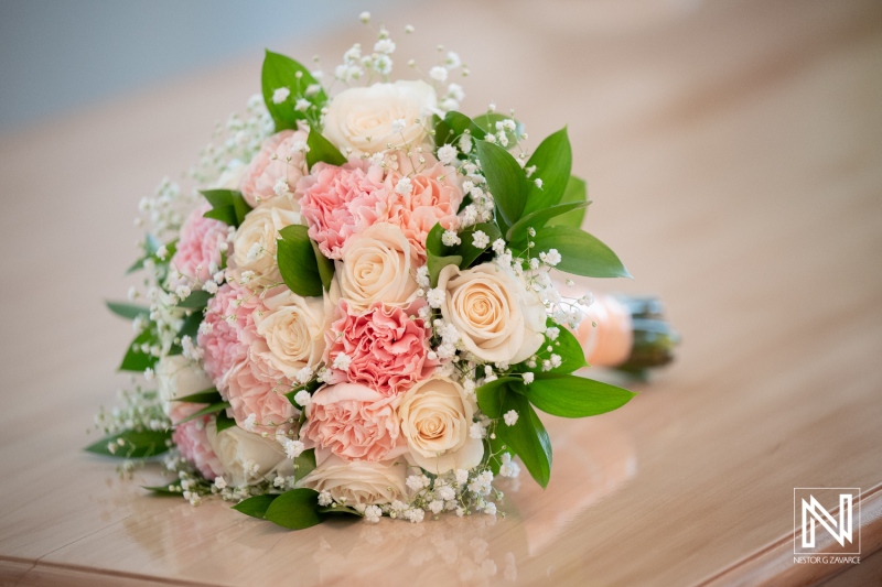 Beautiful wedding bouquet featuring pink and white flowers at a Kranshi wedding in Curacao