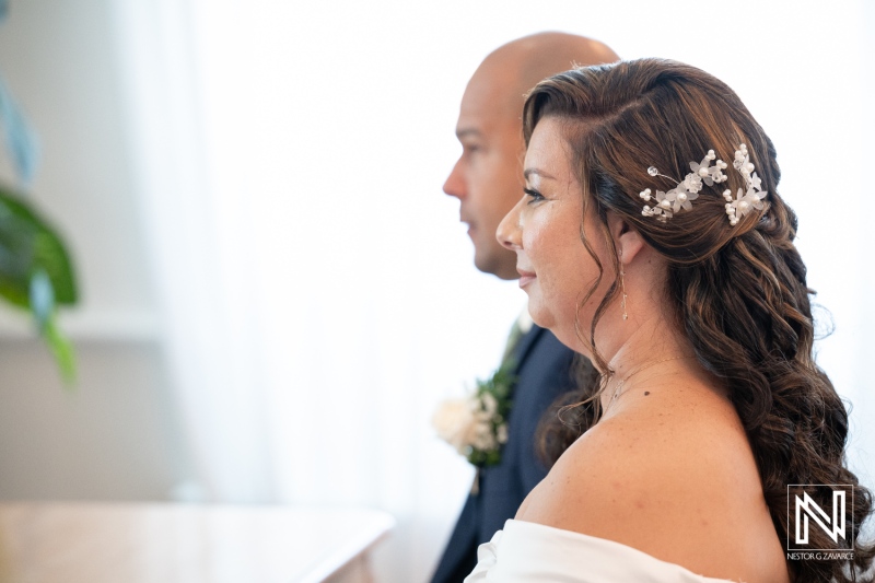 Romantic wedding ceremony at Kranshi, Curacao with beautiful couple exchanging vows