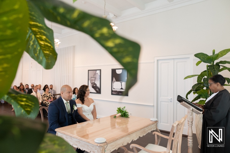 Wedding ceremony at Kranshi in Curacao with beautiful decor and heartfelt moments shared by the couple