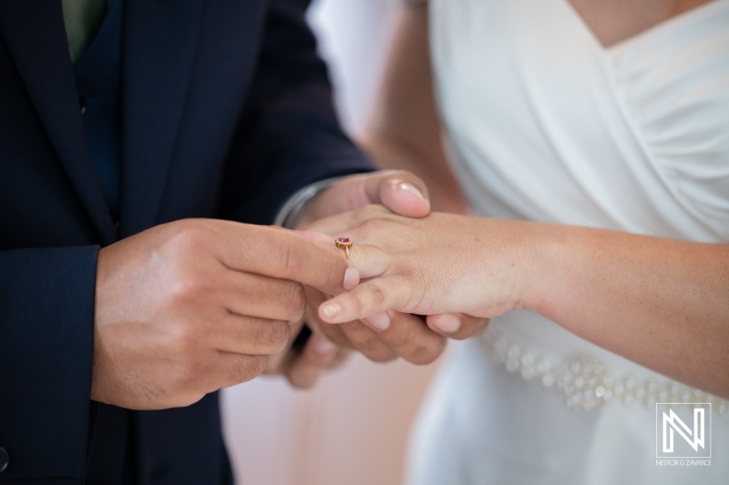 Beautiful wedding ceremony at Kranshi in Curacao with heartfelt ring exchange between the bride and groom