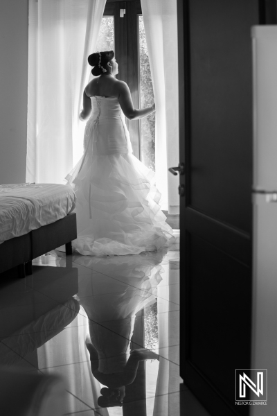 Bridemaid photoshoot looking through the window
