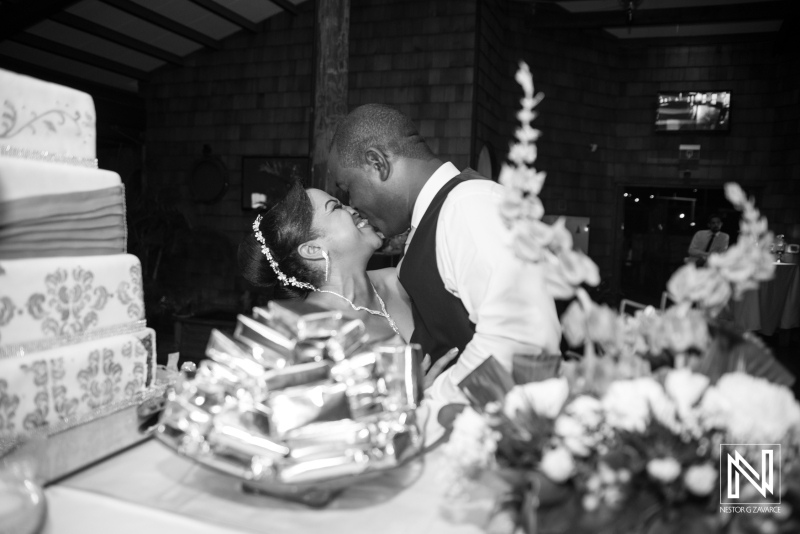 Bride and groom sharing the wedding cake