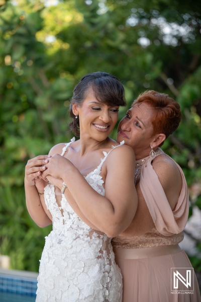 Wedding celebration at Playa Hunku in Curacao with bride and mother enjoying the moment