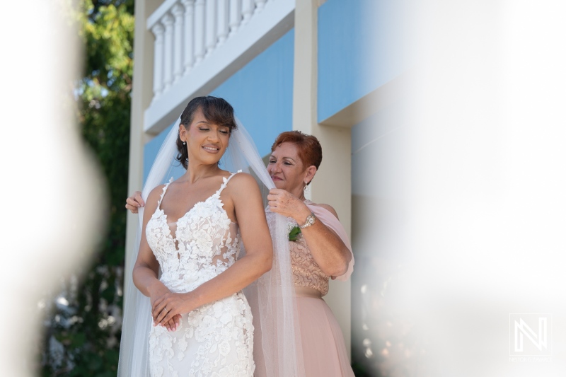 Wedding preparation at Playa Hunku in Curacao with bride and mother getting ready for the ceremony