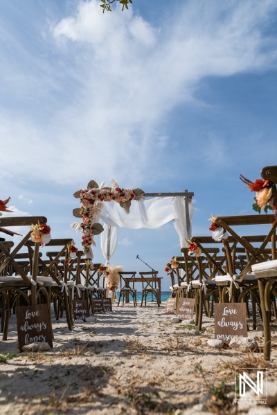 Wedding setup at Playa Hunku in Curacao by the beach with chairs and decorations