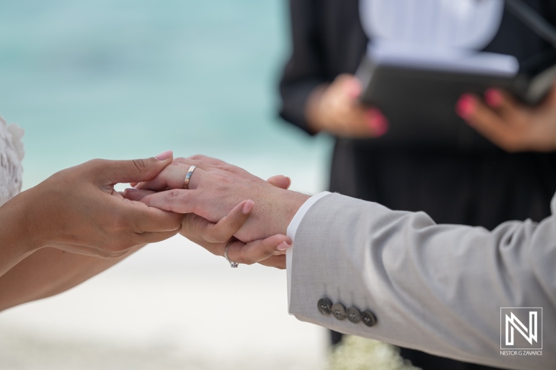 Wedding ceremony at Playa Hunku in Curacao with rings exchanged by the couple