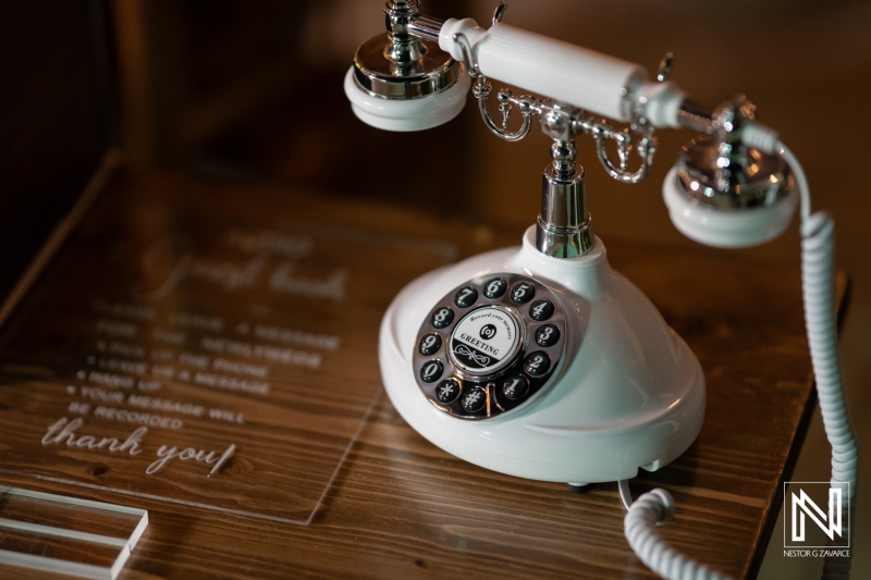 Couple celebrates wedding at Playa Hunku with unique phone decor for guests