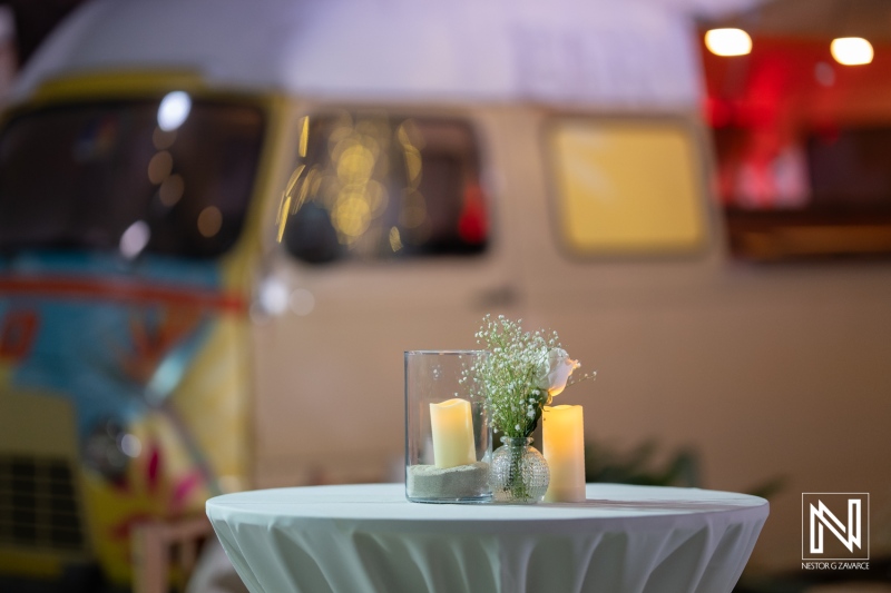 Wedding setup at Playa Hunku with candles and floral arrangements