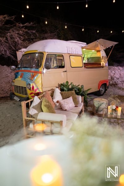Wedding celebration in front of a food truck at Playa Hunku in Curacao during the evening hours