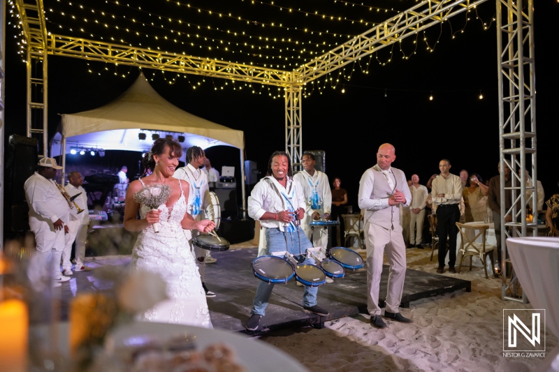 Wedding celebration at Playa Hunku in Curacao with music and dancing