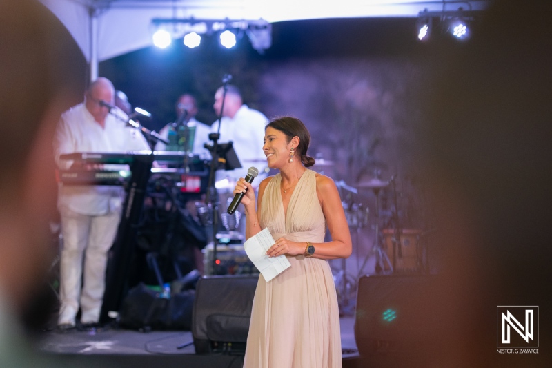 Celebration at Playa Hunku during a wedding ceremony with speeches and music